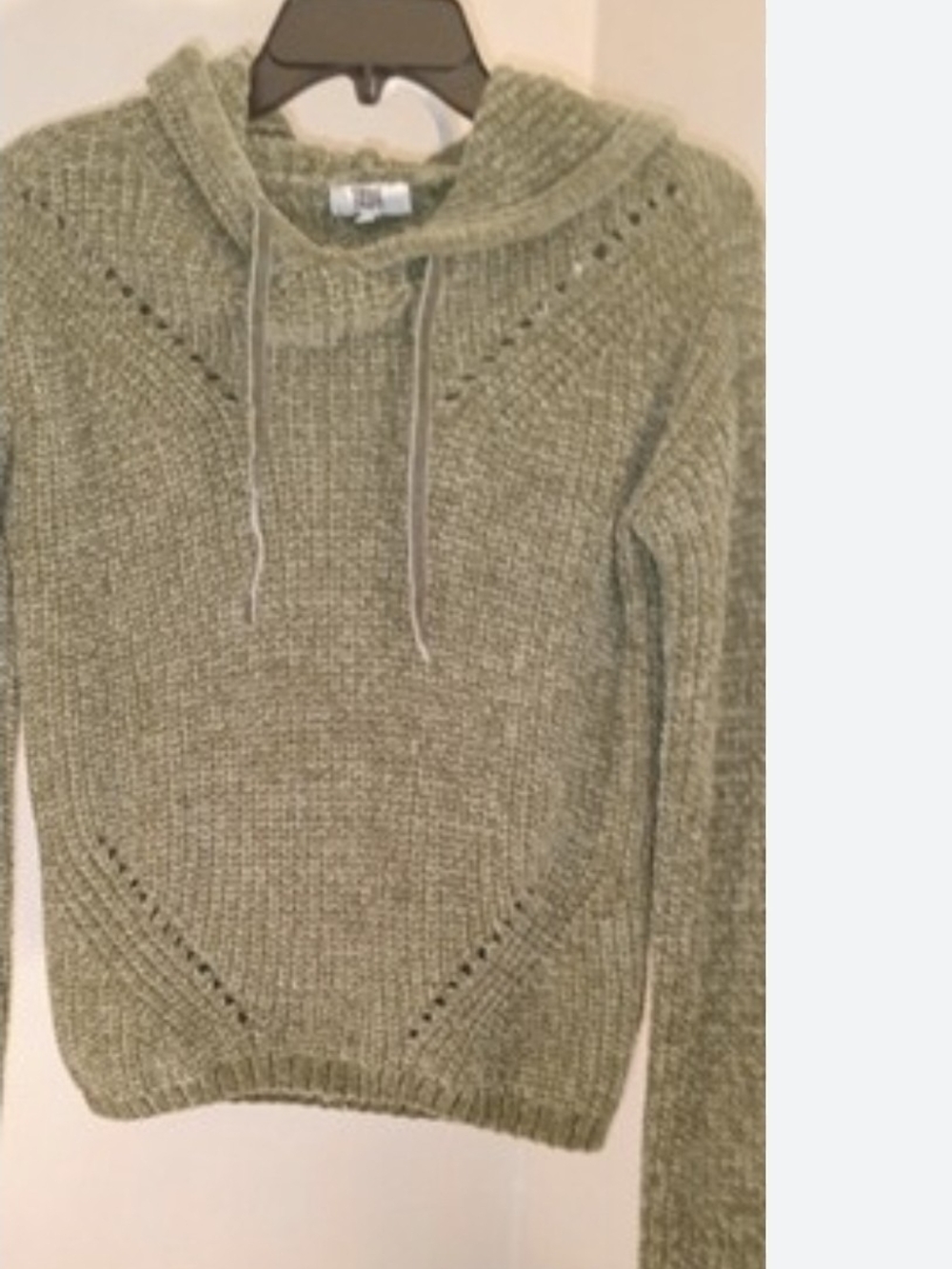 green True Craft hoodie features a chunky, knit texture and a crisscross back de